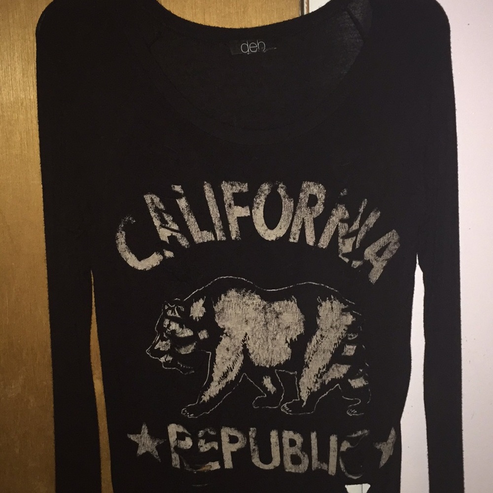 Long sleeve t shirt with rips in the front